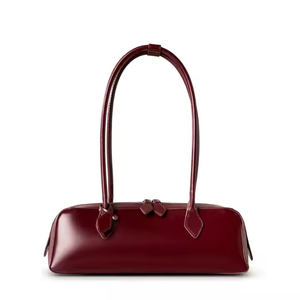 Custom Women's 2025 Nouveau conception de niche coréenne à une épaule à grande capacité Sac sous arme de vache long sac Baguett rouge